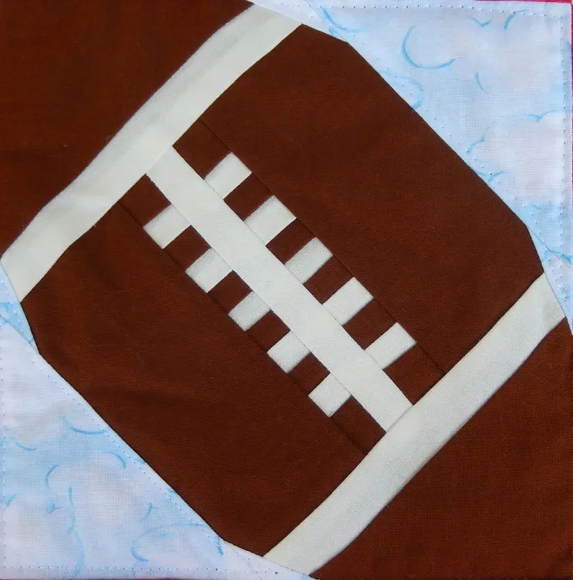 A close up of the football on a blanket