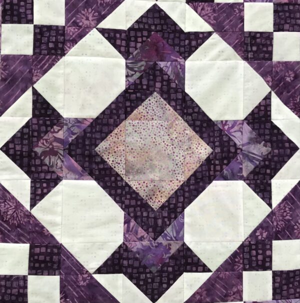 A close up of the quilt pattern