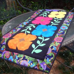 A table runner with flowers on it