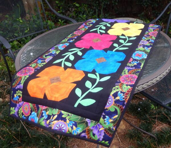 A table runner with flowers on it