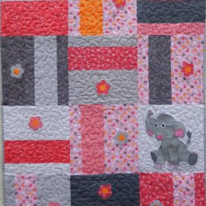 A quilt with an elephant on it