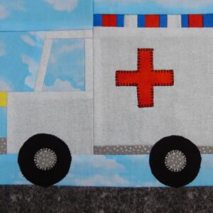 A close up of an ambulance quilt block