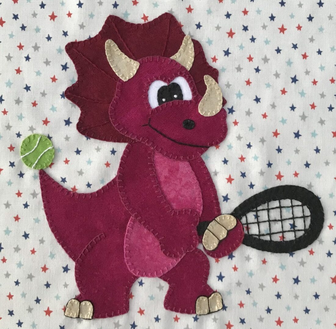 A red dinosaur holding a tennis racket in its mouth.