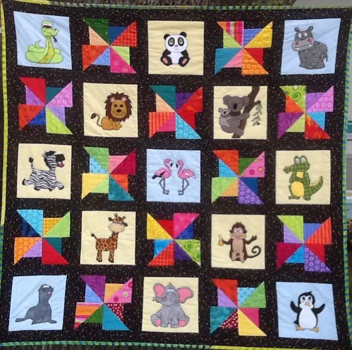A quilt with different animals on it