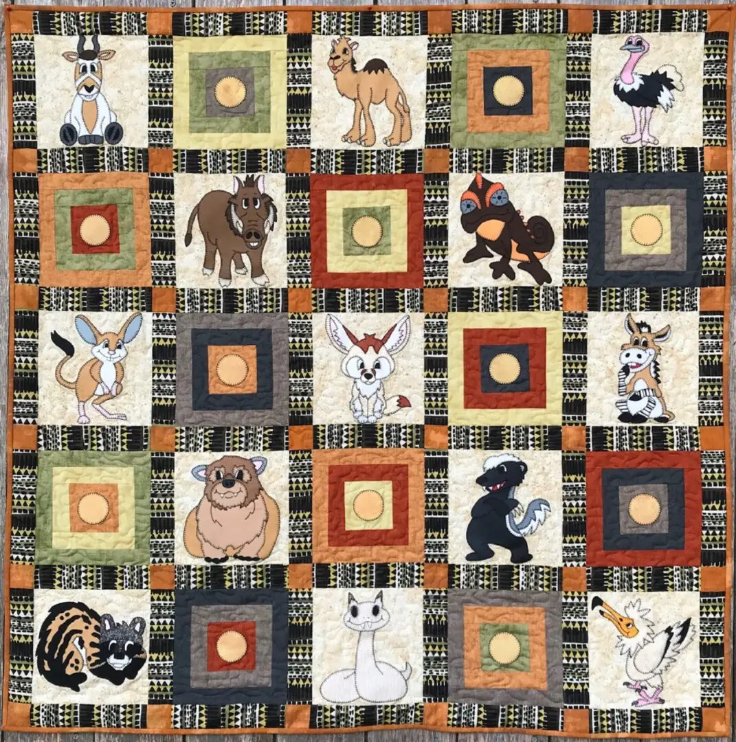 A quilt with different animals on it