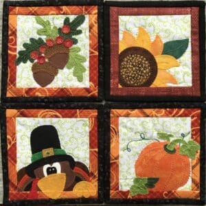 A set of four thanksgiving themed coasters.