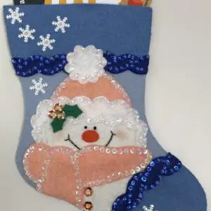 A christmas stocking with a snowman on it.