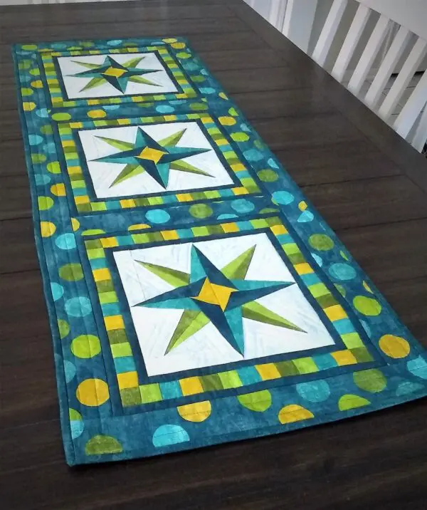 A table runner with a star design on it.