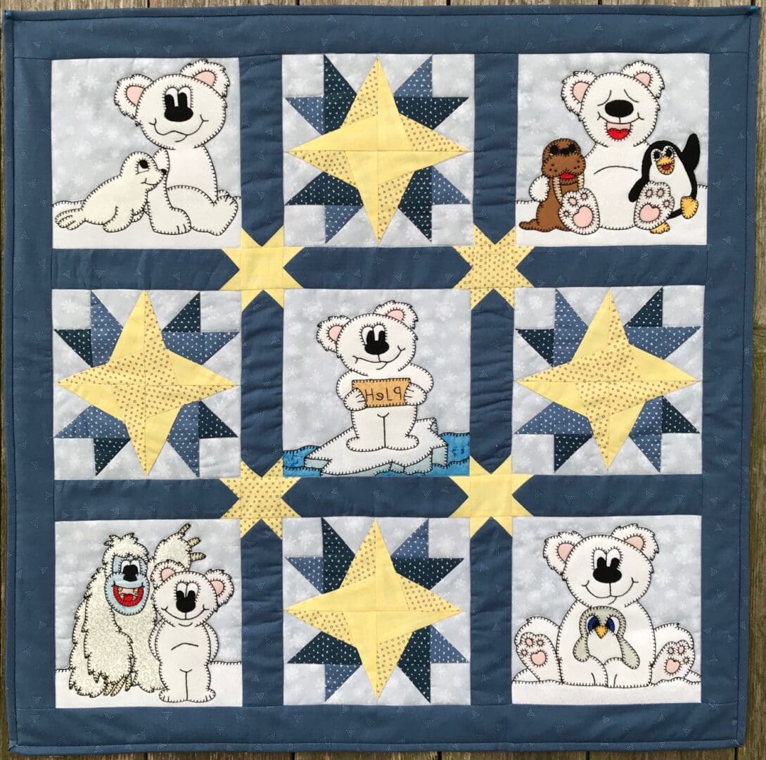 A quilt with nine bears and stars on it.