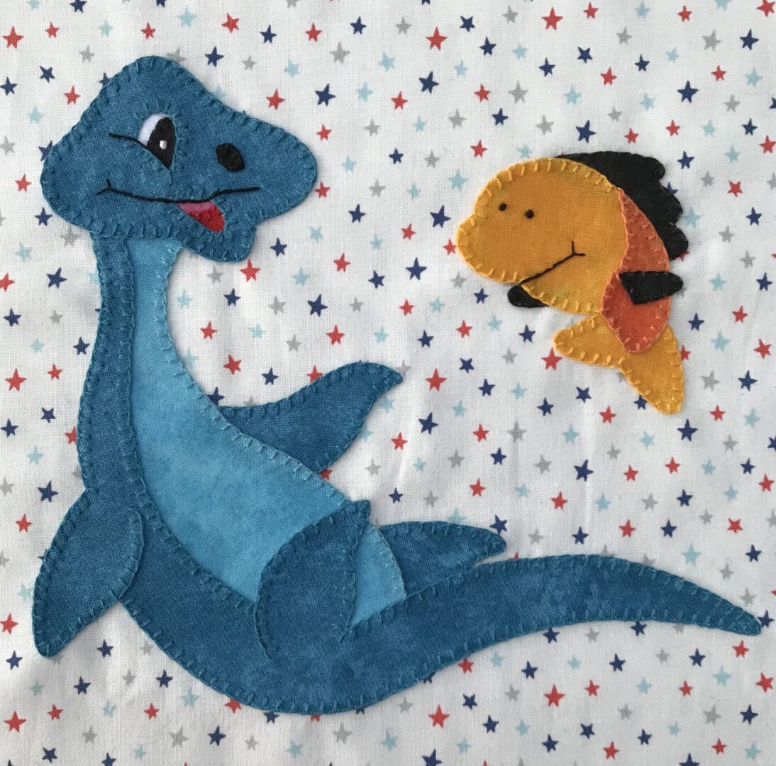 A blue dinosaur and a yellow fish on a white background