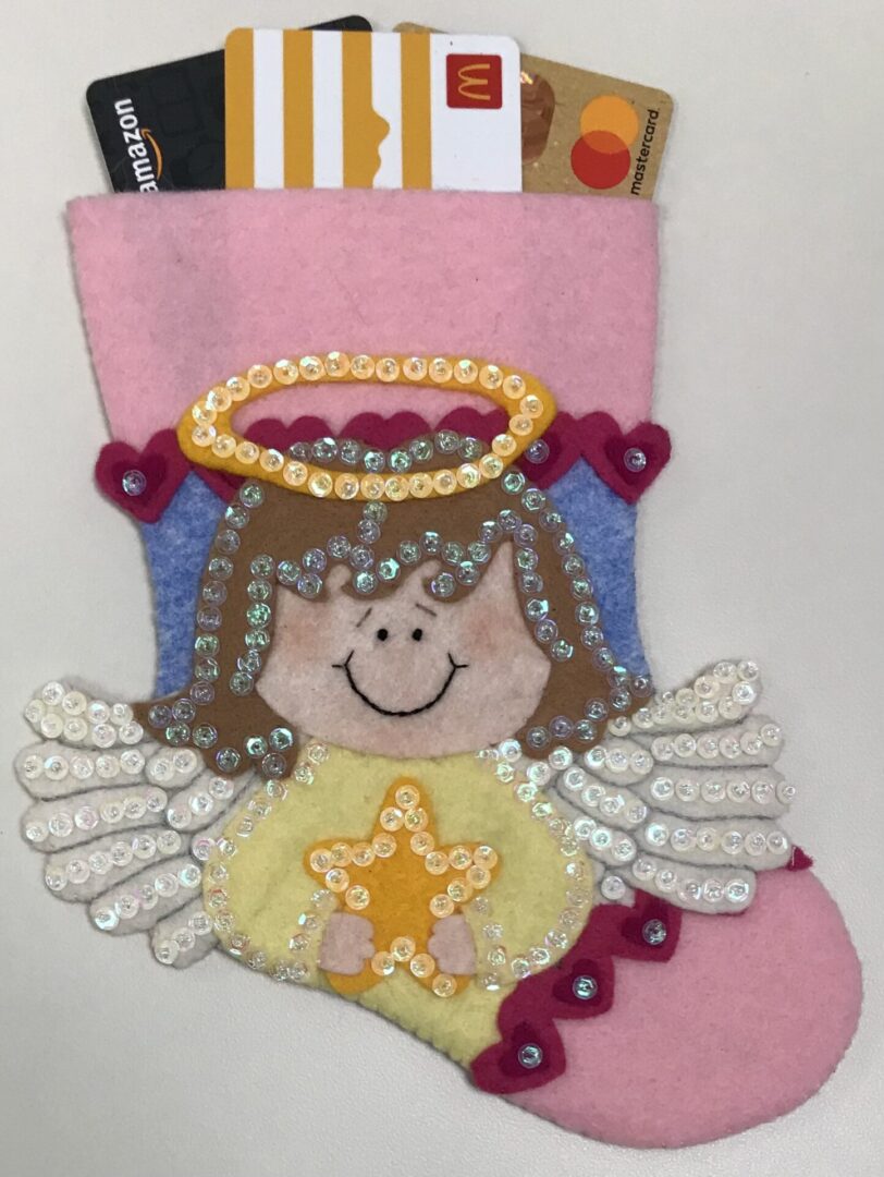 A felt stocking with Angel Girl 1 Gift Card Holder.