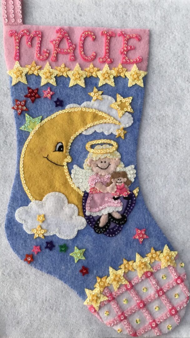 An Angel with Moon Stocking.