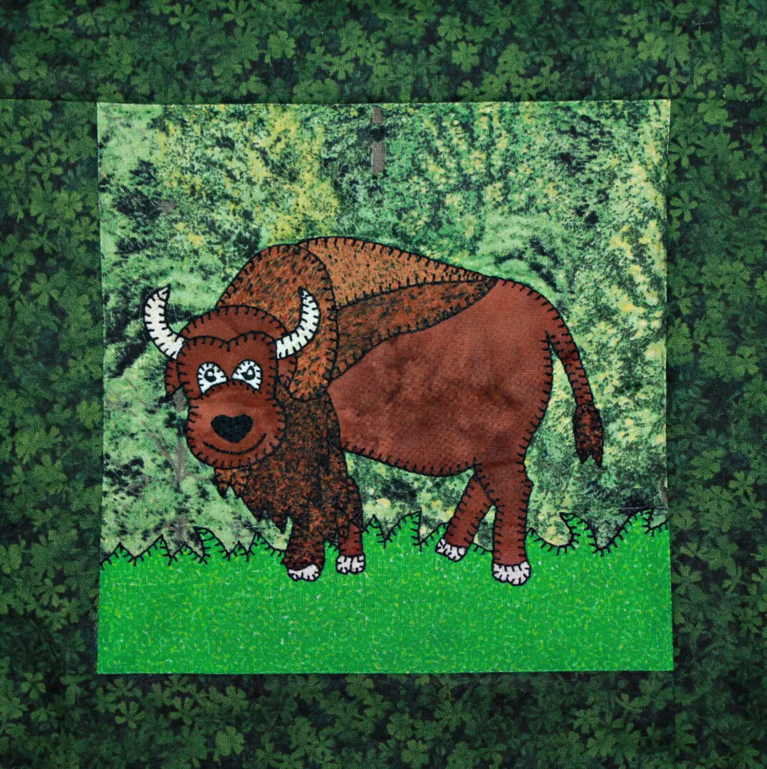 A picture of a Bison on a green background.