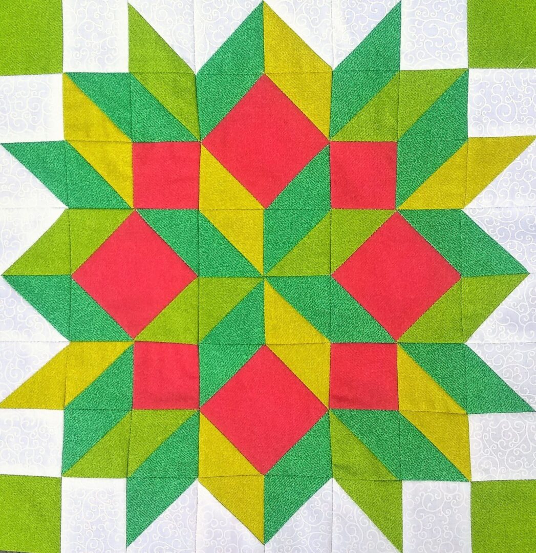 A Carpenters Wheel Star quilt block on a white background
