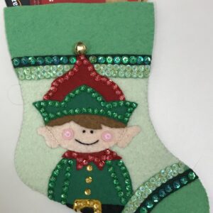 A felt stocking with an Elf Box Gift Card Holder.