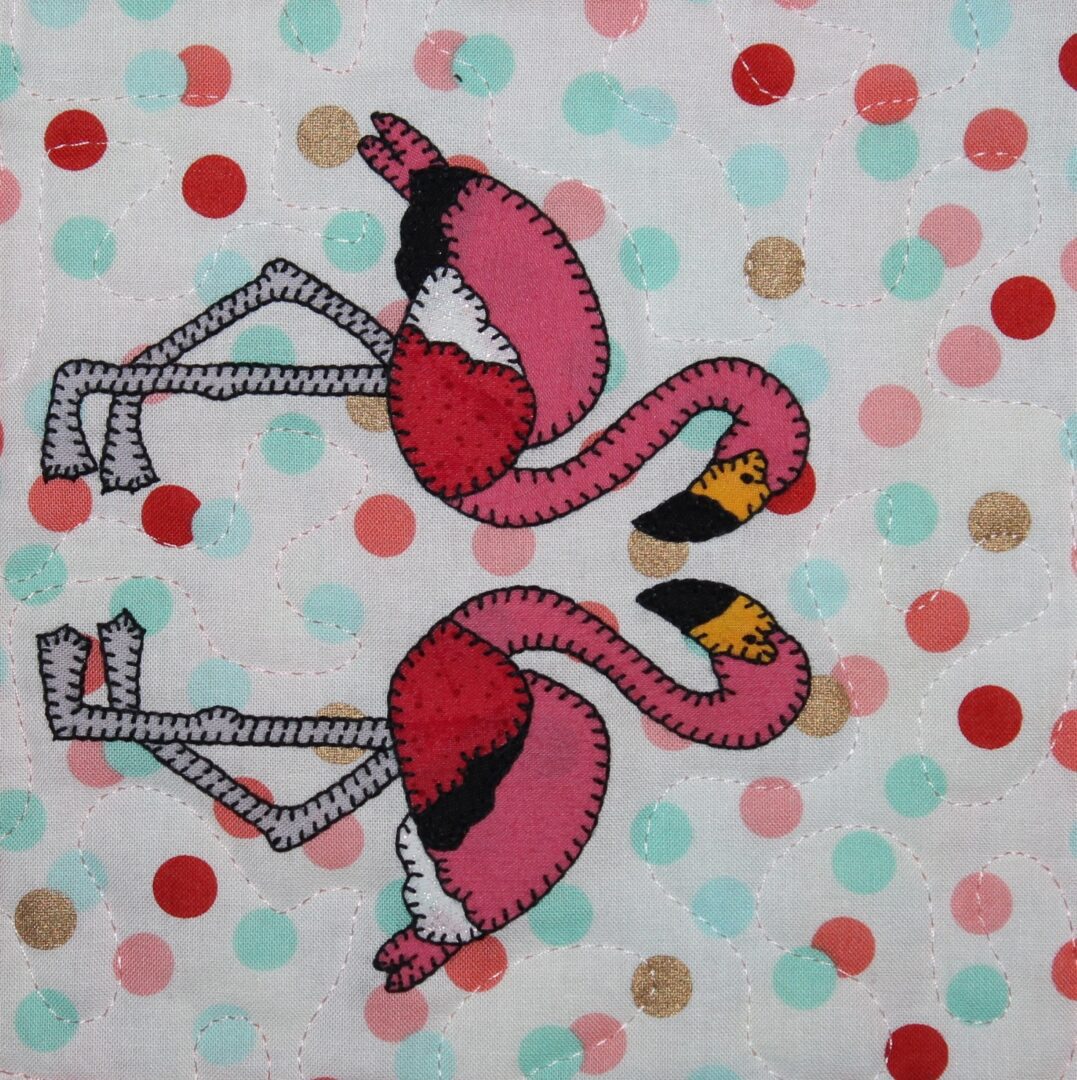 Two pink Flamingos on a polka dot background.