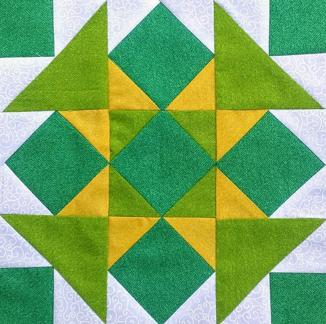 A quilt with green and yellow squares called the Gettysburg Star.