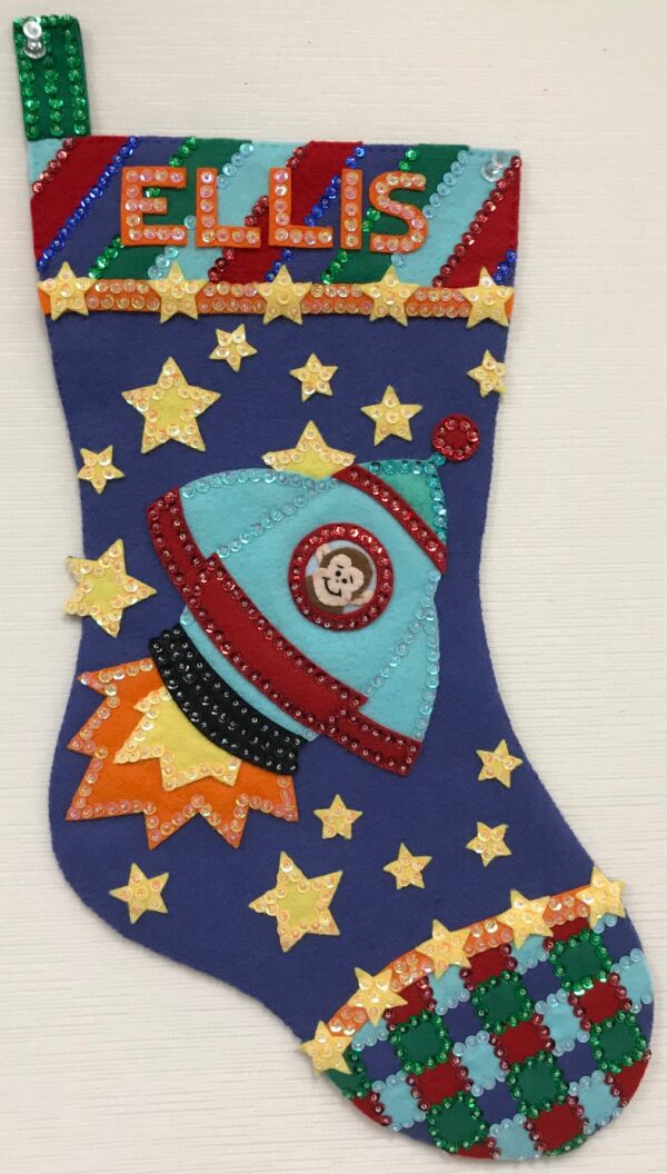 A Rocket Monkey Stocking with stars.