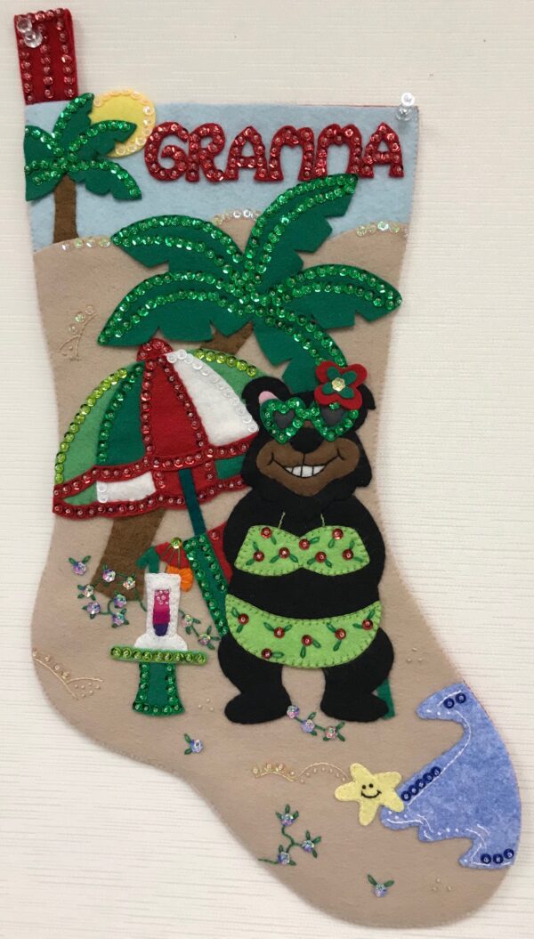 A Beach Bear Stocking with a bear and a beach scene.