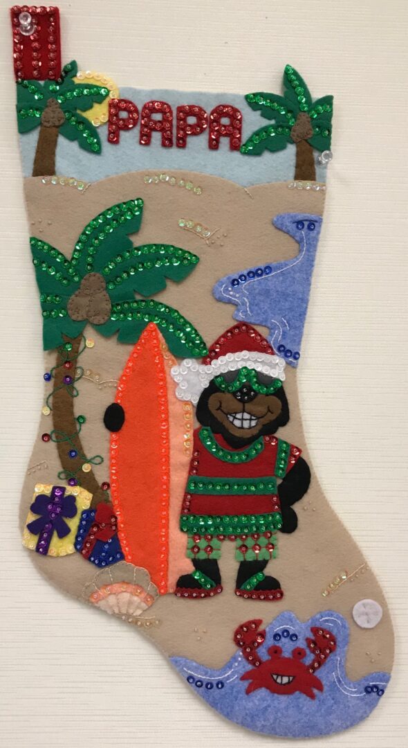 A Surfer Bear Stocking with a Santa Claus and a surfboard.