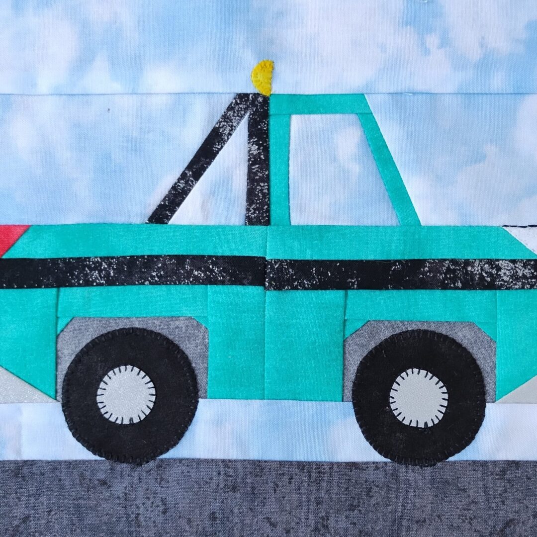 A quilt block with a Pickup Truck on it.