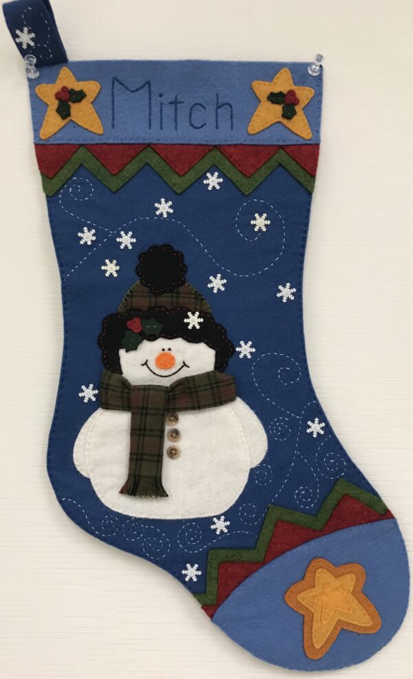 A Primitive Snowman Stocking.