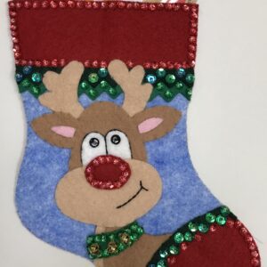 A felt reindeer stocking with Reindeer Gift Card Holder in it.