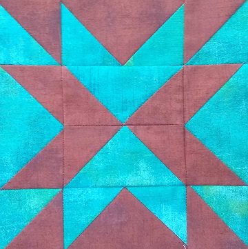 A close up of a Double Arrow quilt block.