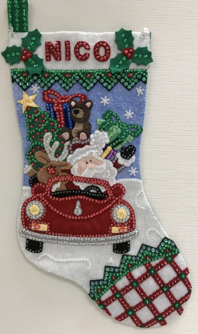 A Santa's Convertible Stocking with santa claus in a car.