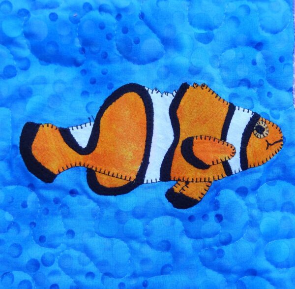 A Clown Fish on a blue background.