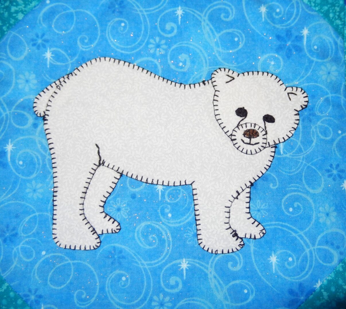 A white Polar Bear on a blue background.