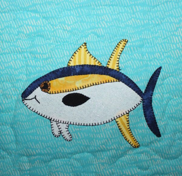 A blue and Yellowfin Tuna appliqued on a blue background.