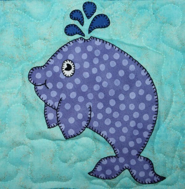 A blue Whale with polka dots on a blue background.